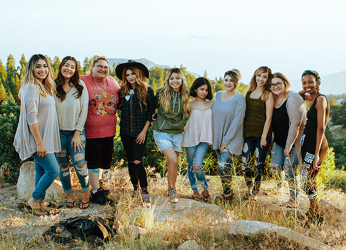 Group picture of business women outside